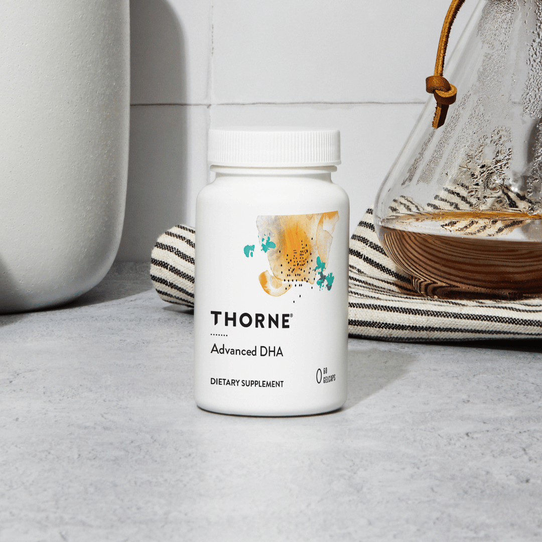 Thorne Advanced DHA by Thorne, omega-3 DHA softgels in premium supplement bottle with front label packaging.