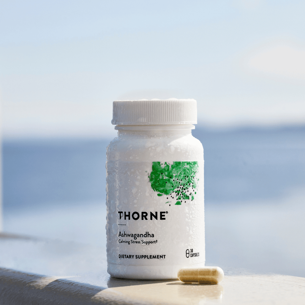 Thorne Ashwagandha by Thorne, ashwagandha capsules in premium supplement bottle with front label packaging.