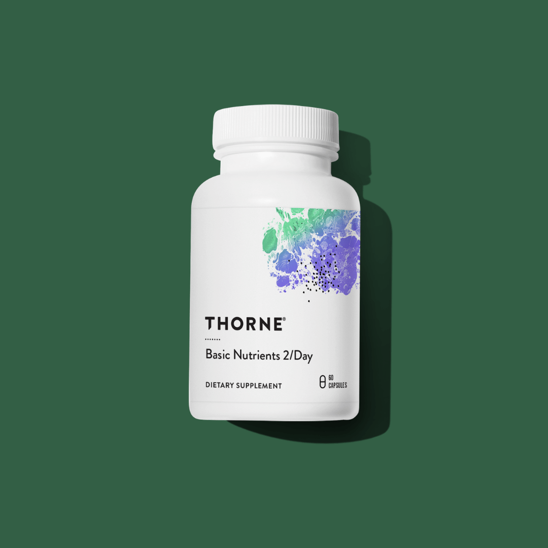 Thorne Basic Nutrients 2/Day by Thorne, multivitamin capsules in premium supplement bottle with front label packaging.