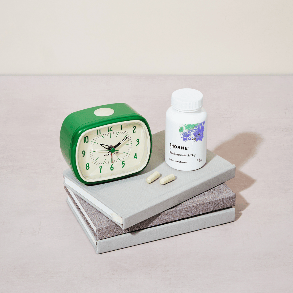 Thorne Basic Nutrients 2/Day by Thorne, multivitamin capsules in premium supplement bottle with front label packaging.
