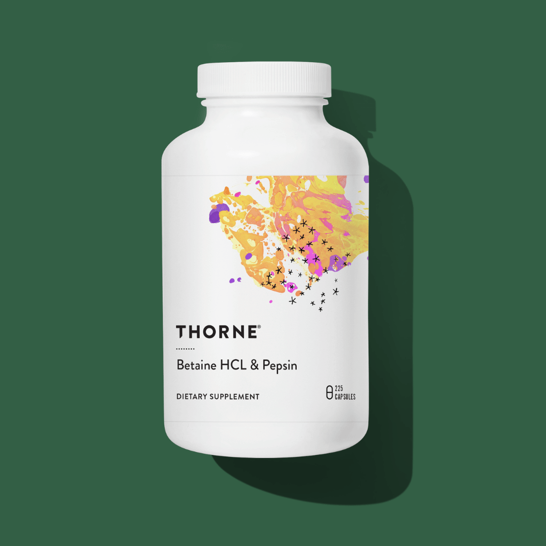 Thorne Betaine HCL & Pepsin by Thorne, betaine HCl and pepsin capsules in premium supplement bottle packaging.