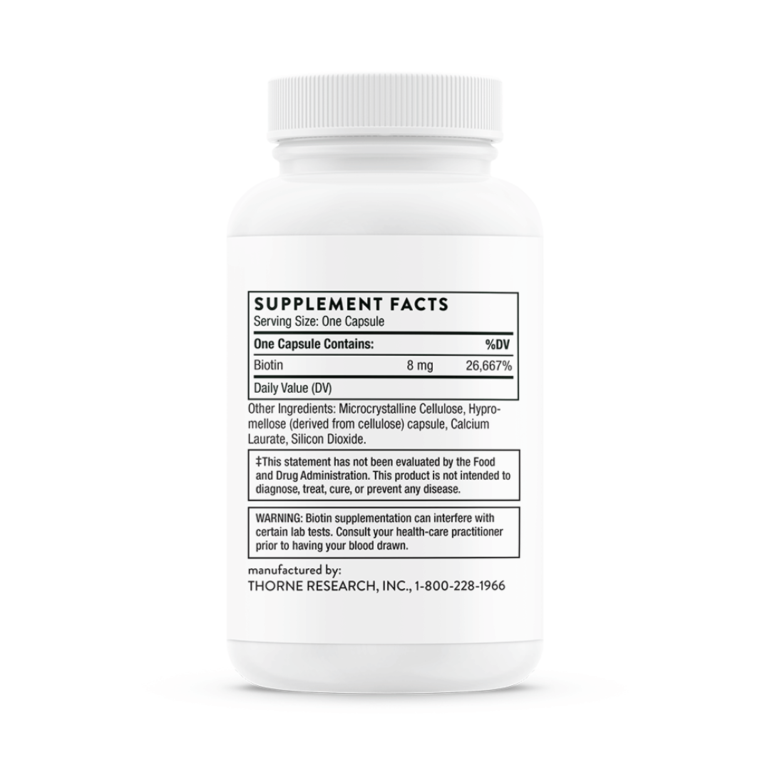 Thorne Biotin by Thorne, biotin capsules in premium supplement bottle with front label packaging.