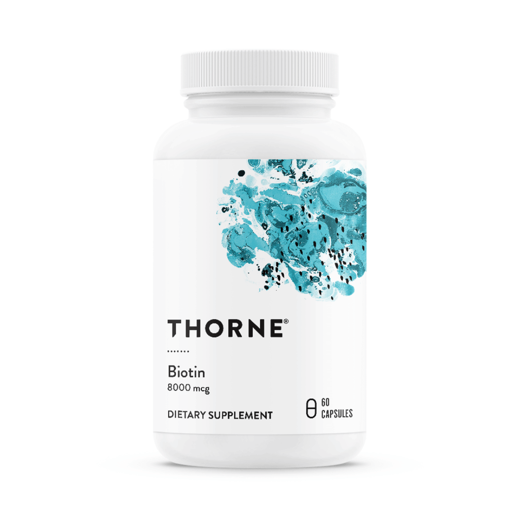 Thorne Biotin by Thorne, biotin capsules in premium supplement bottle with front label packaging.