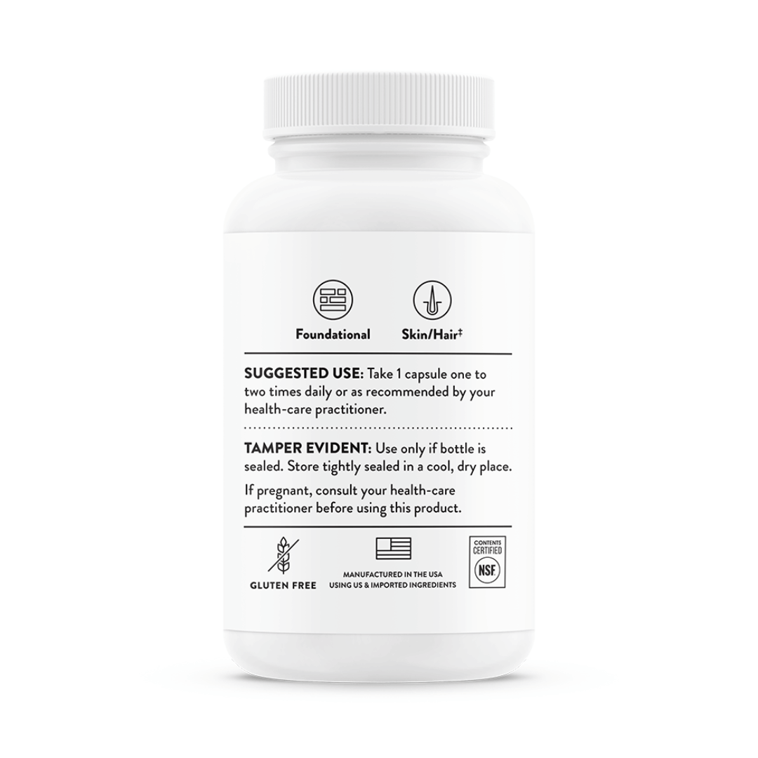 Thorne Biotin by Thorne, biotin capsules in premium supplement bottle with front label packaging.